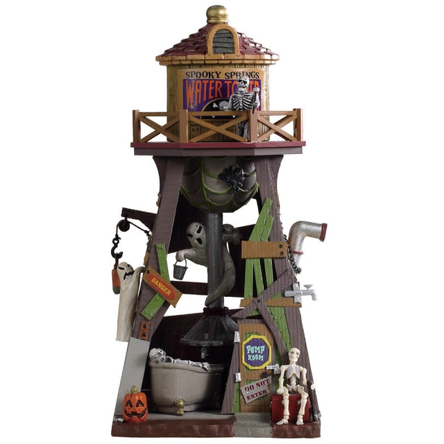 Polyresin village accent for a Lemax display. Designed to look like an old timey Western water tower. There are skeletons and pumpkins and a ghost.