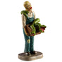Polyresin figurine for a Lemax Spooky Town display. Designed to look like a spooky skeleton wearing overalls. He's holding a box of scary plants.