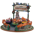 Polyresin and plastic figurine for a Lemax Village tabletop display. Designed to look like a carnival ride