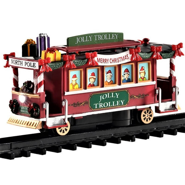 Plastic train for a Lemax Village tabletop display. Train is Christmas themed