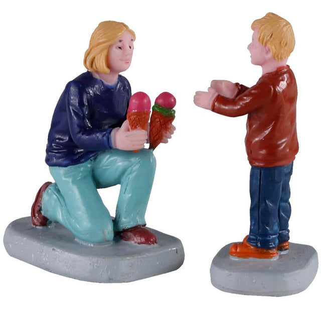 Polyresin figurines for a Lemax display. Designed to look like a mom kneeling down handing an ice cream cone to a little boy.