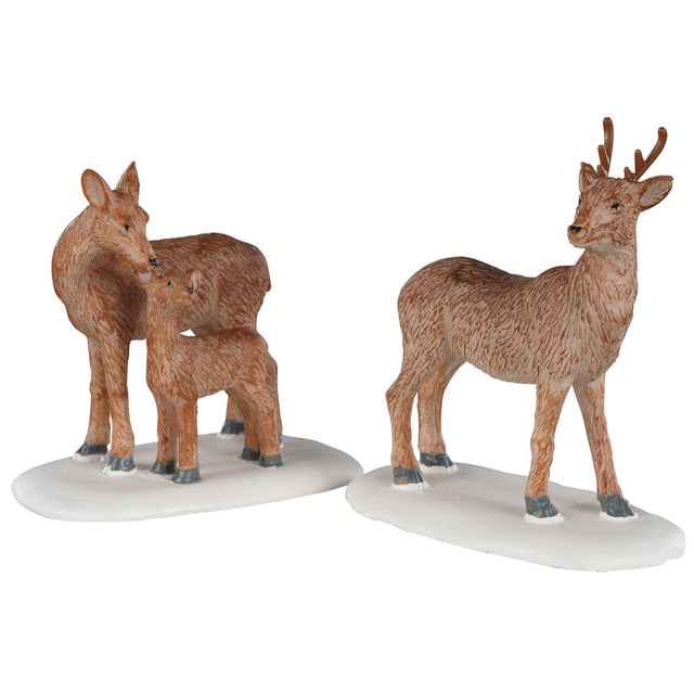 Polyresin figurines for a Lemax Village tabletop display. Designed to look like a trio of deer standing on snow