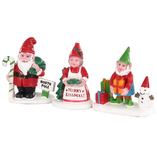 Polyresin figurines for a Lemax Village tabletop display. Designed to look like a trio of gnomes in Christmas gear. Gnome wi