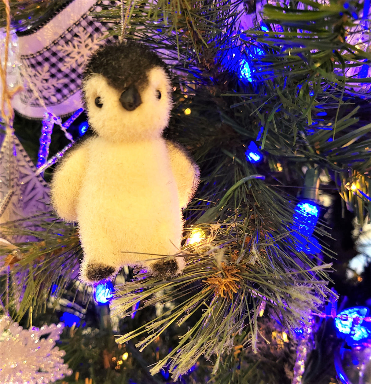 Soft ornaments shaped like penguins.