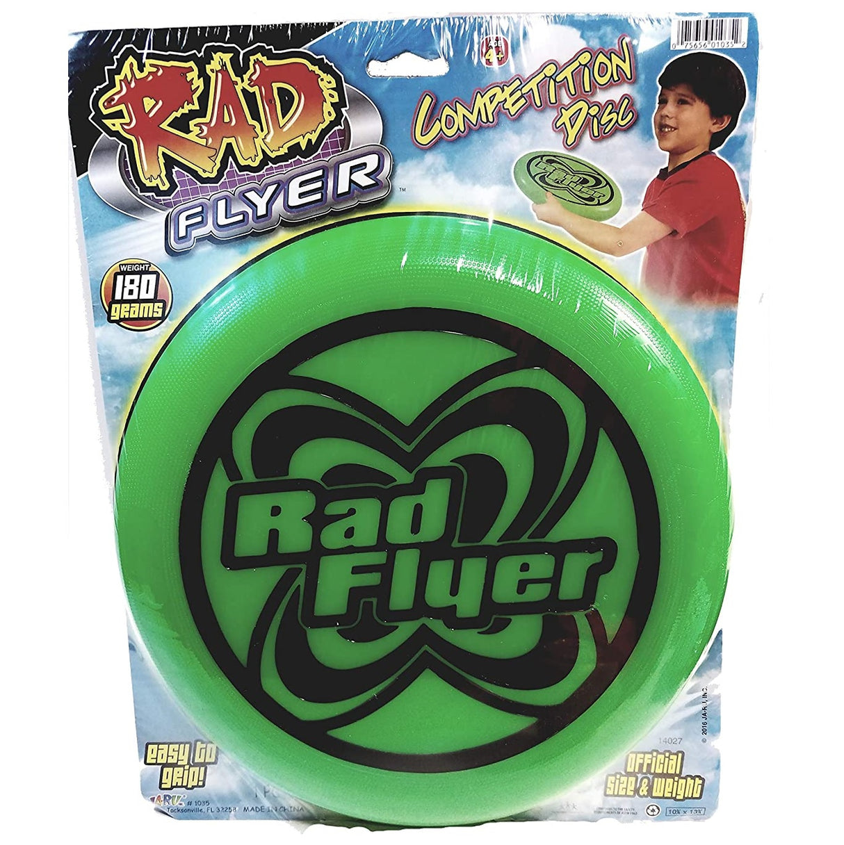 This picture shows the green frisbee inside the packaging. It shows a boy getting ready to throw it and it reads "competition disc." At the bottom of the packaging, it reads "Easy to grip" on the left side and it reads "Official size and weight" on the right side.
