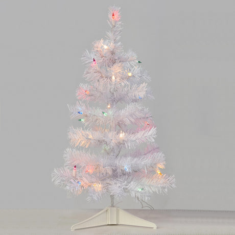 Small white tree pre-lit with multi-colored lights.