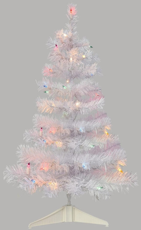 Small white tree pre-lit with multi-colored lights.