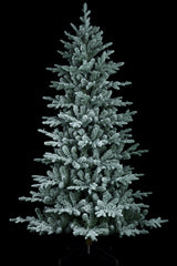 Artificial tree pre-lit with Starry lights. Branches are covered in white to appear covered in snow.