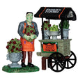 Polyresin figurines for a Lemax Spooky Town display. Designed to look like Frankenstein selling flowers out of a cart.