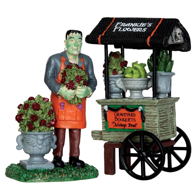Polyresin figurines for a Lemax Spooky Town display. Designed to look like Frankenstein selling flowers out of a cart.