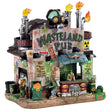 Porcelain lighted building for a Lemax display. Designed to look like an apocalyptic and rusty pub. There are flames coming out of the chimneys and a plague mask statue on the roof. There are biohazard warnings everywhere and lots of green ooze. There's a monster behind the bar. The bar looks like it's been made out of a car bumper.