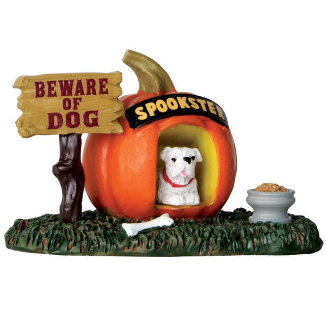 Polyresin figure for a Lemax display. Designed to look like a dog house shaped like a pumpkin. There's a sign next to the dog house that reads "BEWARE OF DOG." The sign above the dog house entrance reads "SPOOKSTER." There's a bone and a bowl of dog food on the grass.
