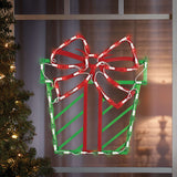Illuminated Present Window Silhouette
