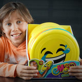 This picture shows a smiling boy holding the box of all the different frisbees.