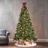 Artificial tree pre-lit with dual lights. Lights change from clear to multi-colored lights. The tree also features red berries and white glitter.