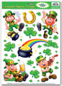 Window cling decorations for St. Patrick's Day. The clings are shaped like leprechauns wearing green outfits and green top hats, shamrocks, a pot of gold with a rainbow coming out of it and a gold horseshoe.