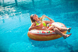 Inflatable inner tube designed to look like a donut with frosting and multi-colored sprinkles.