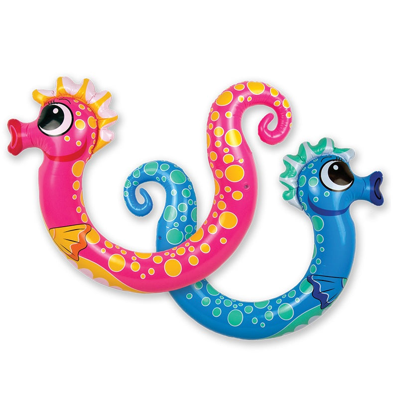 Pool inflatables shaped like seahorses. One is pink and one is blue.