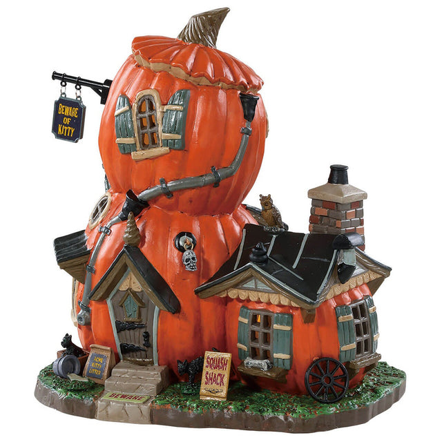 Porcelain building for a Lemax display. Designed to look like a shack made out of pumpkins.