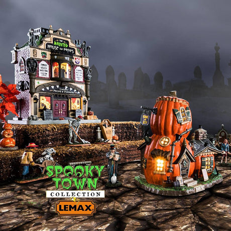 Porcelain building for a Lemax display. Designed to look like a shack made out of pumpkins.