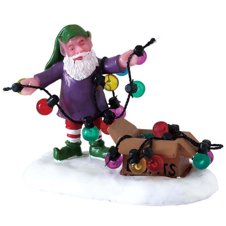 Village figurine for a Lemax display. Designed to look like an elf untangling lights from a box.