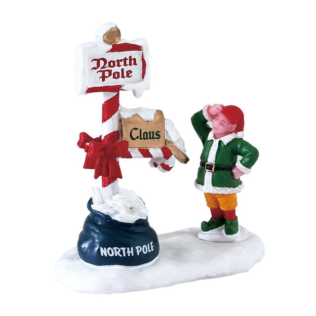 Village figurine for a Lemax display. Designed to look like an elf looking at the mail for Santa at the North Pole.