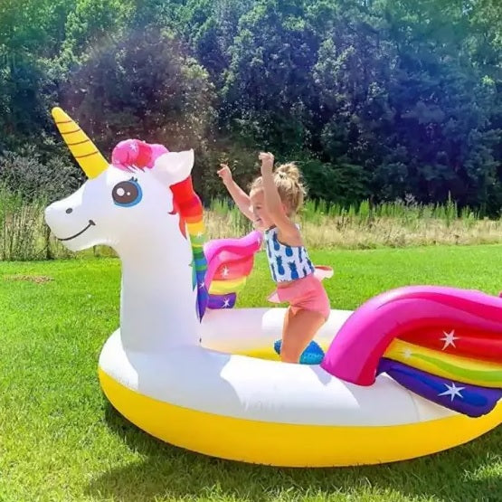 Inflatable pool for kids shaped like a rainbow unicorn.