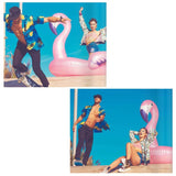 Ride on pool inflatable shaped like a pink flamingo.