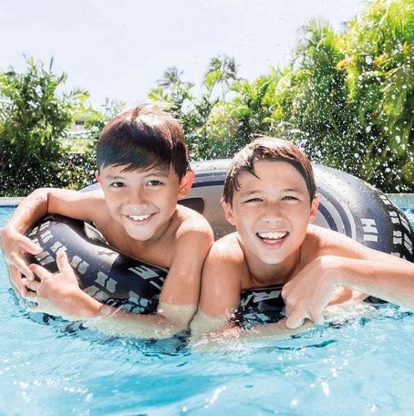 Inflatable inner tube designed to look like a car tire.