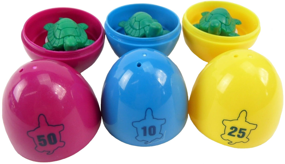 Dive and retrieval swim toys shaped like eggs with numbers on them.