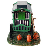 Polyresin village accent for a Lemax display. Designed to look like a green, purple and red cart that reads "PUMPKIN FESTIVAL." There are jack-o-lanterns on the ground and a skeleton standing next to the cart.