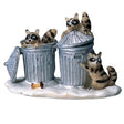 Polyresin figurine for a Lemax display. Designed to look like three raccoons digging through two shiny, silver garbage cans. There's a half eaten apple core on the ground. The ground appears to be covered in snow.