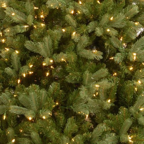 Artificial tree pre-lit with clear lights.