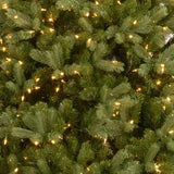 Artificial tree pre-lit with clear lights.