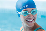 Clear swimming goggles with blue eye cups.