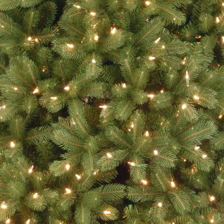 Artificial tree pre-lit with clear lights.