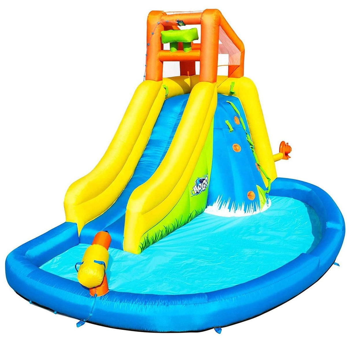 Massive inflatable backyard water park for kids. There's a small water slide that lands into a small pool and there's a fun wall to climb.