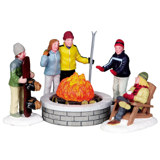 Plastic figurines for a Lemax Village tabletop display. Designed to look like a group of five people standing around a fire after a long day of skiing and snowboarding