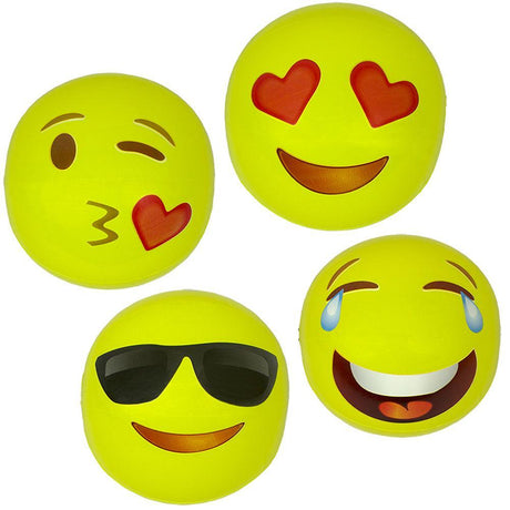 Yellow beach balls designed to look like different emojis.