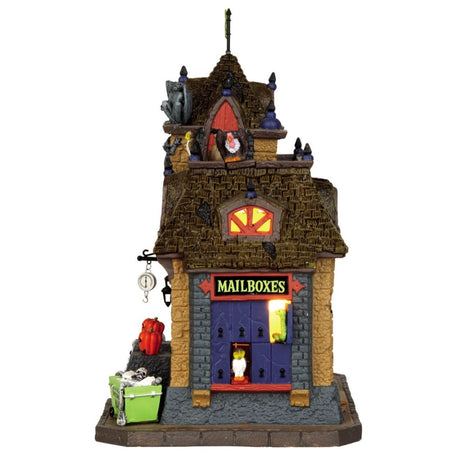 Porcelain building for a Lemax display. Designed to look like a post office decorated with gargoyles, skeletons, owls, vultures, carved pumpkins and a skeleton sorting mail.