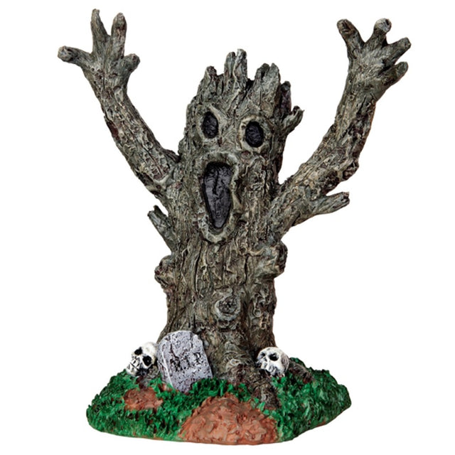 Polyresin figurine for a Lemax display. Designed to look like a spooky tree with a face. There are skulls and a tombstone at the base.