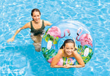 Inner tube detailed with pink flamingos and green leaves.