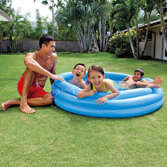 Blue inflatable pool for kids.
