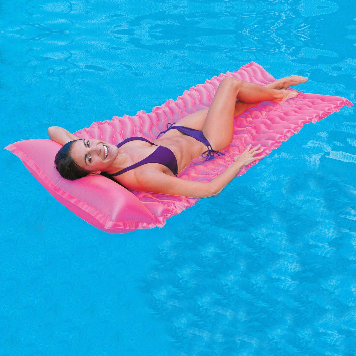 Inflatable pool mattress. This one is pink.