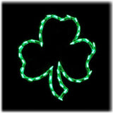 Lighted silhouette shaped like a green shamrock.