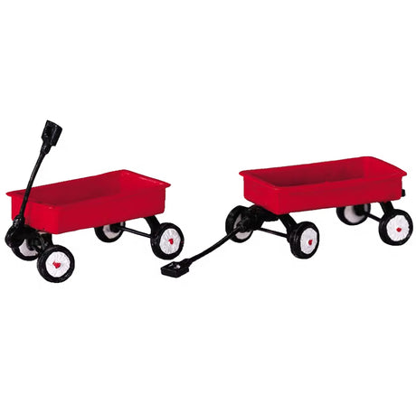 Metal village accessories for a Lemax display. Designed to look like two red wagons with black frames.