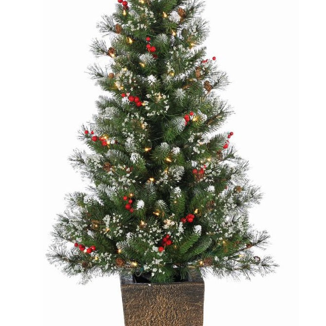 Potted artificial tree. The tree tips are white to look like snow. The lights are warm white and there are red berry accents.