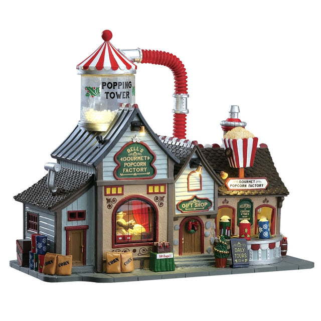 Lemax village building designed to look like four homes put together to make one building that makes popcorn.