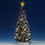 Lemax village accessory designed to look like a snow-covered tree that has yellow lights on it and a yellow star on top.