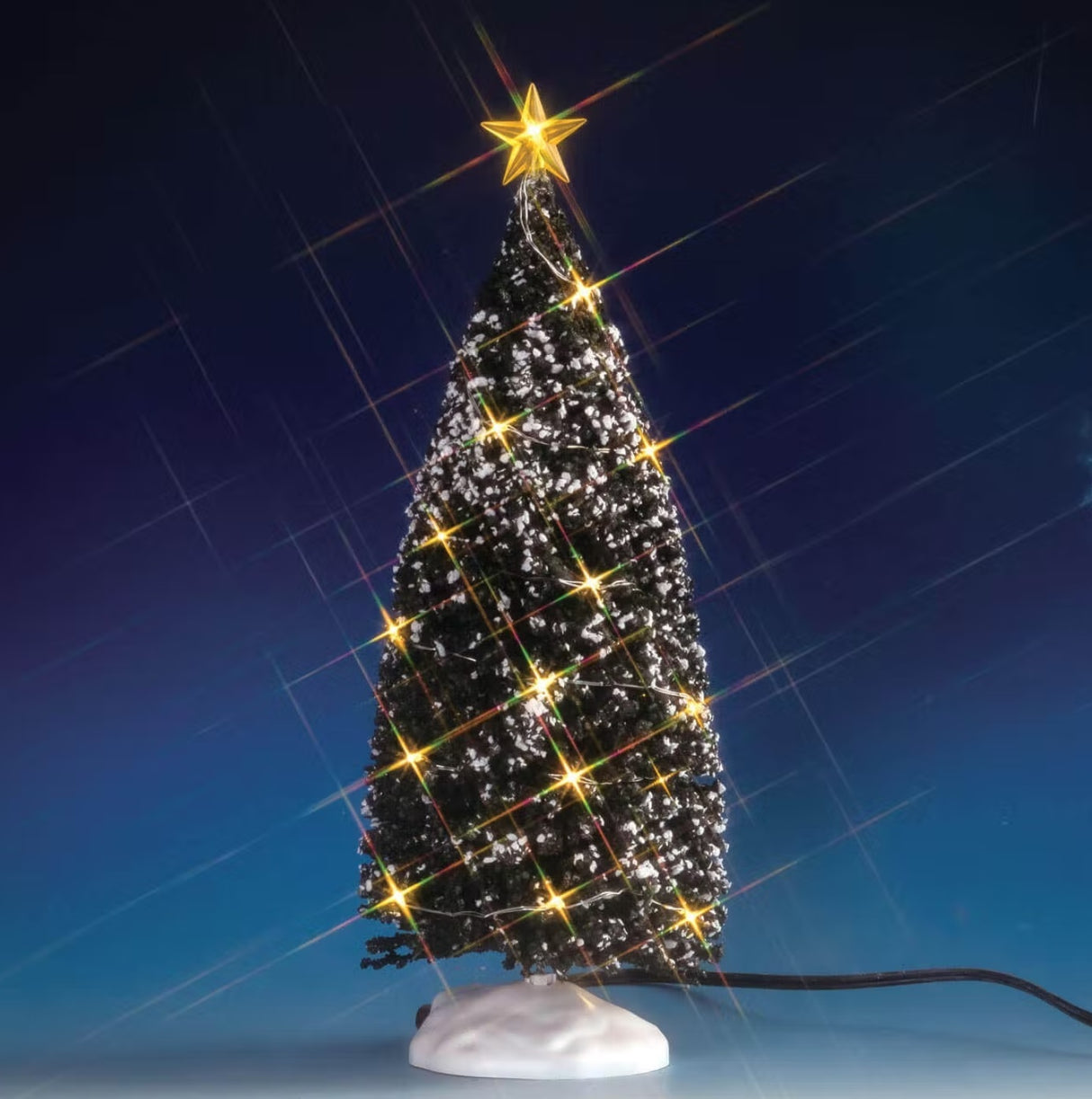Lemax village accessory designed to look like a snow-covered tree that has yellow lights on it and a yellow star on top.